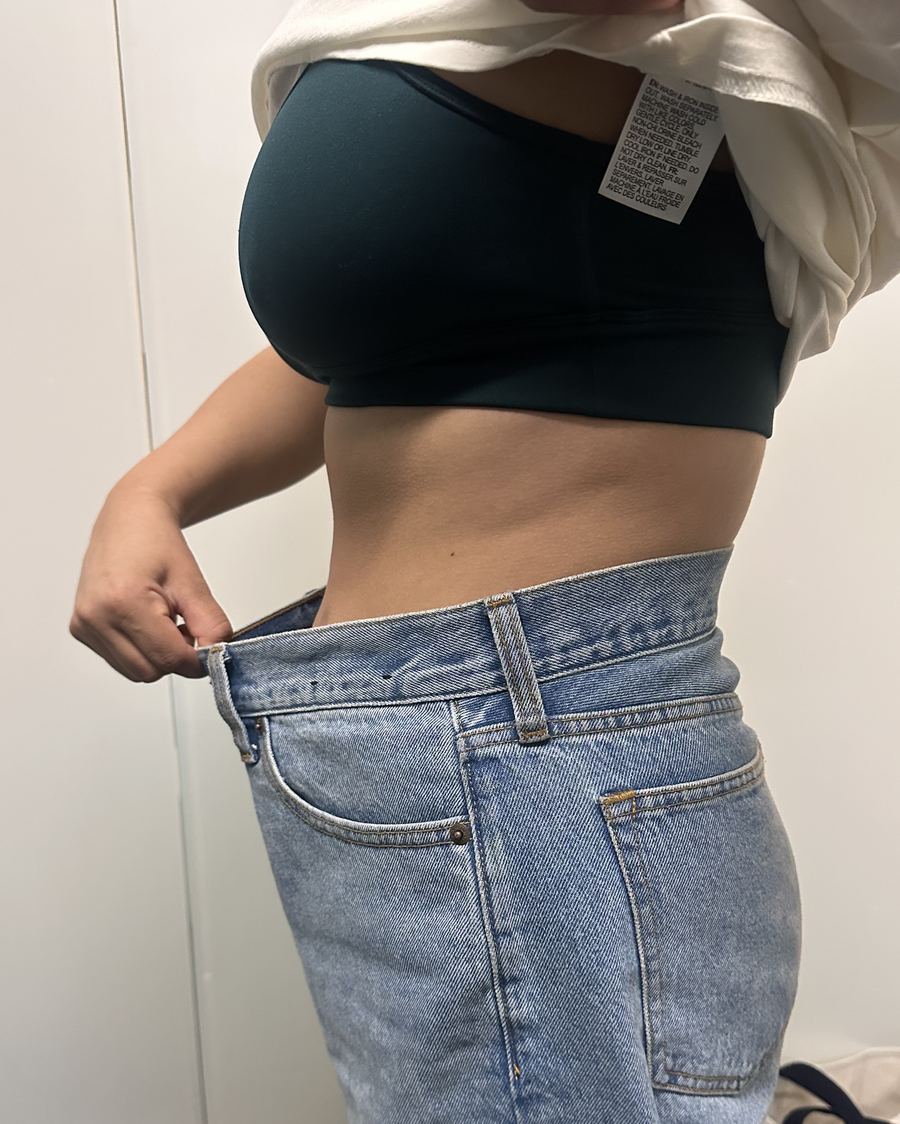 Client showing her waistline progress with GLP-1 skinny shots